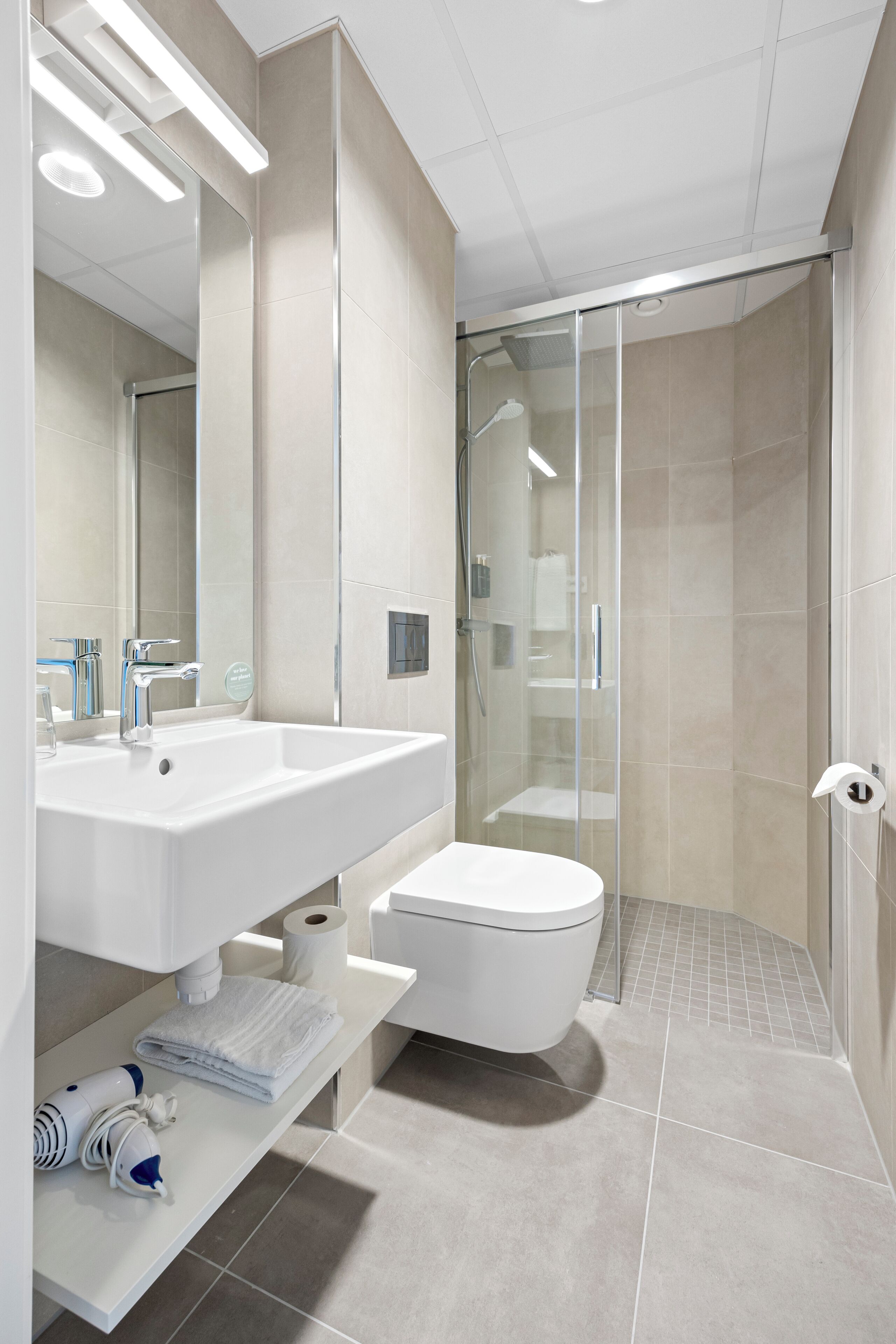 superior room | bathroom | shower, free toiletries, hair dryer, heated floors