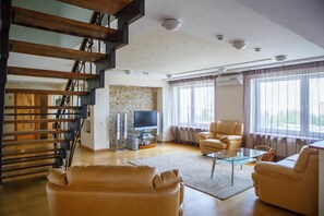 Duplex, 1 Bedroom, Sauna | Living room | TV