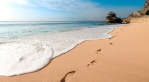 Private beach, white sand, free beach shuttle, beach towels