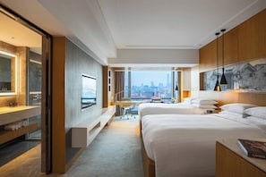 Premium bedding, down comforters, minibar, in-room safe