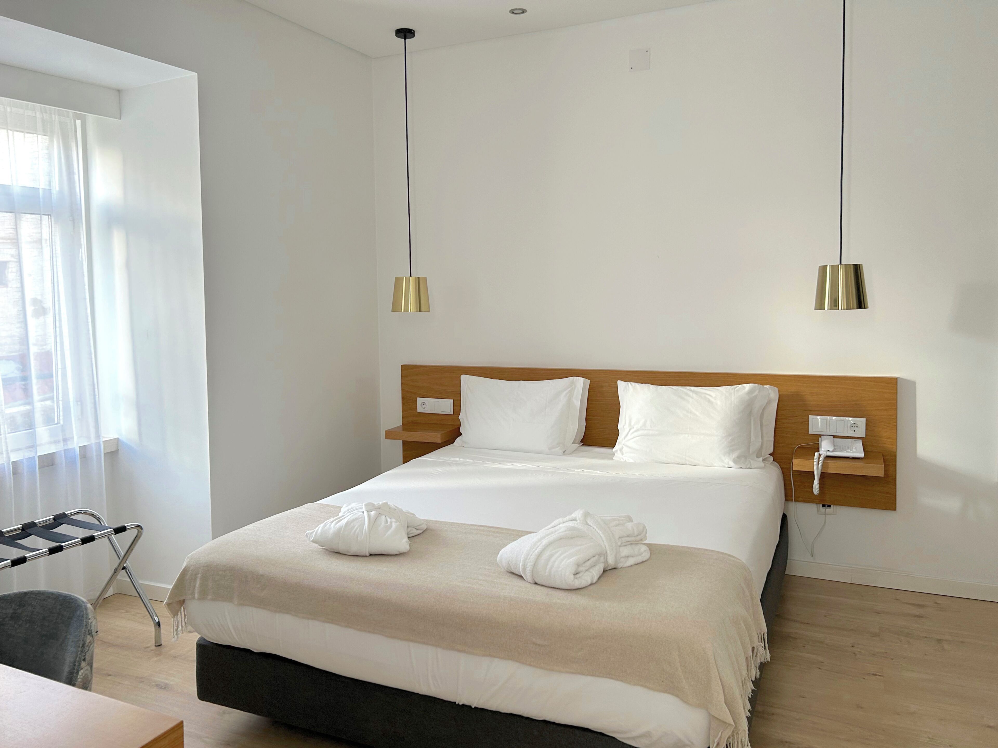 Habitación City doble, 1 cama doble, balcón, en la zona del jardín | Minibar, caja fuerte, escritorio y cortinas opacas