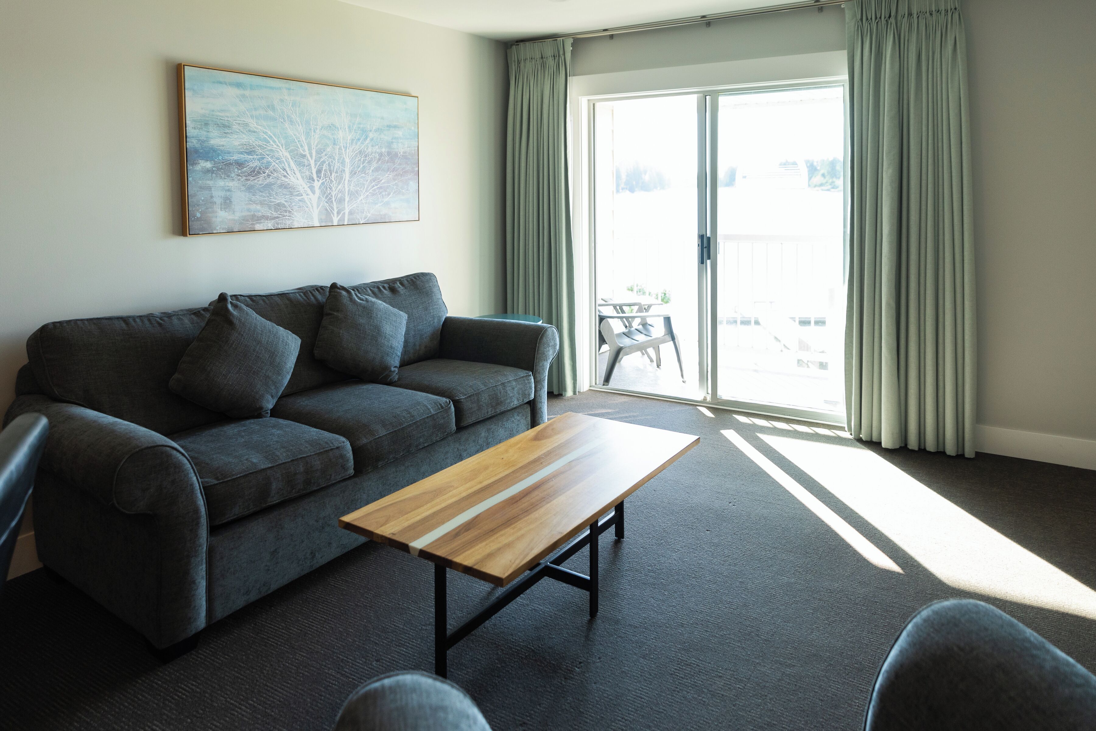 1 bedroom 2 queen lakeview family suite - no pets | living area | 42-inch flat-screen tv with cable channels, tv