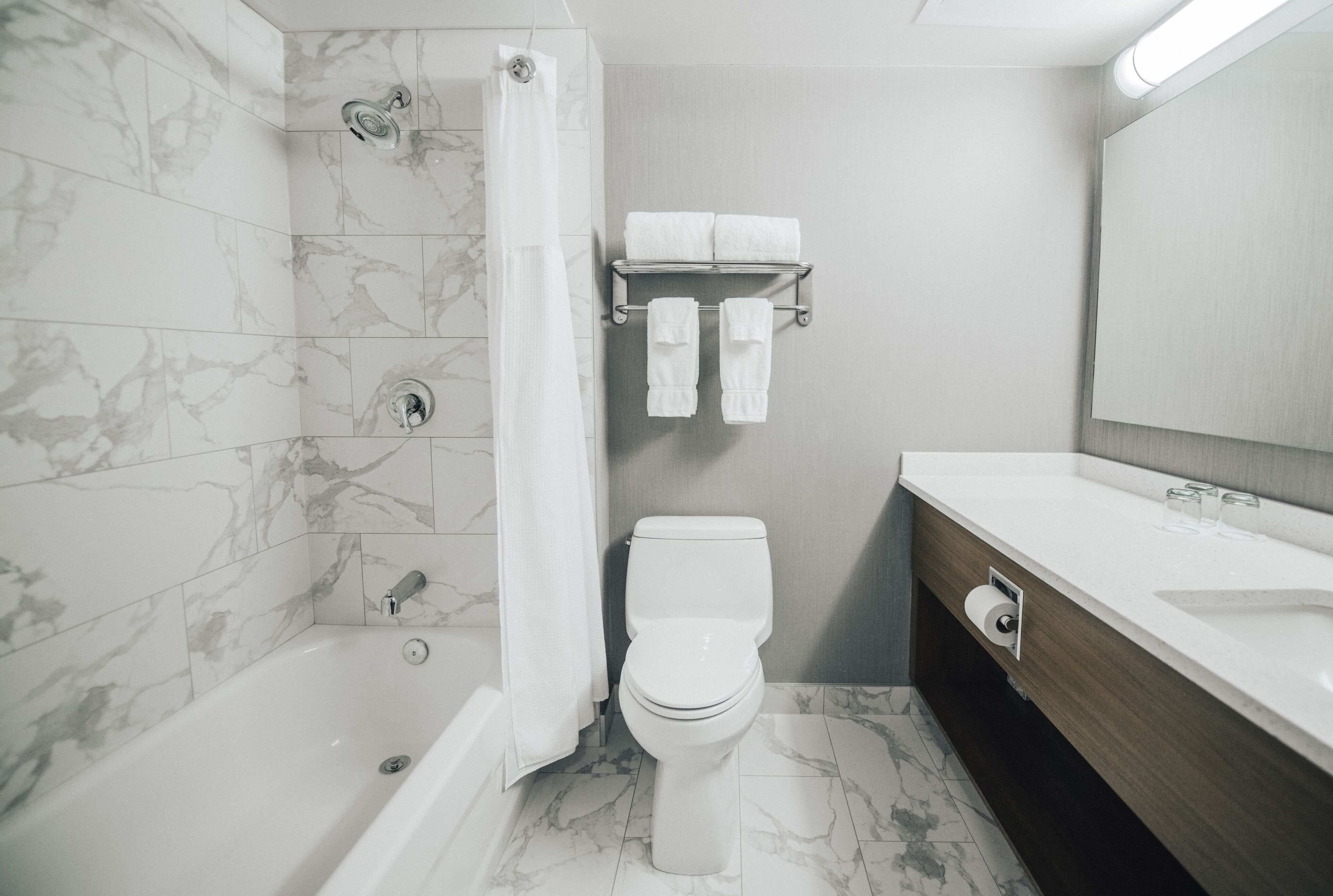 deluxe room, 1 king bed | premium bedding, pillow-top beds, in-room safe, desk