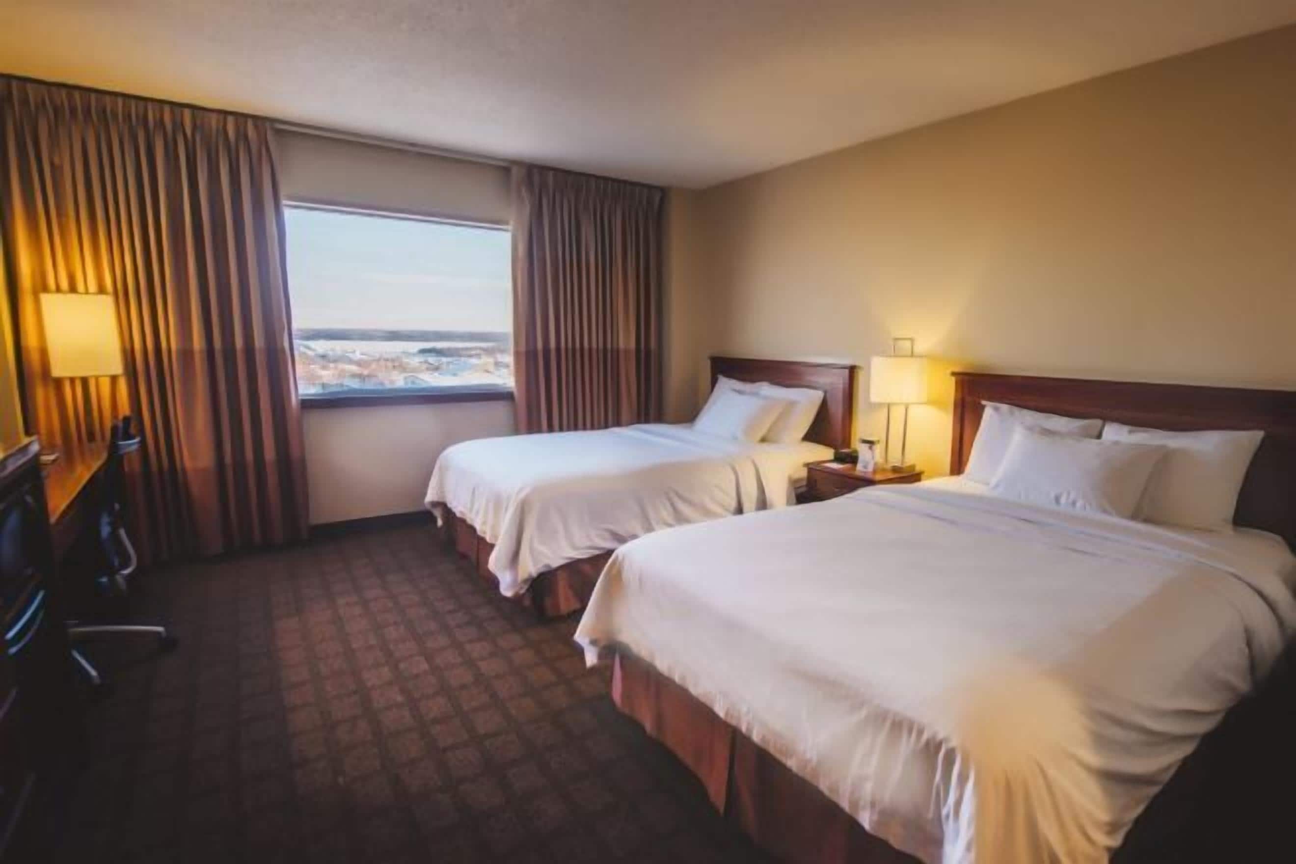 Premium bedding, pillow-top beds, in-room safe, desk