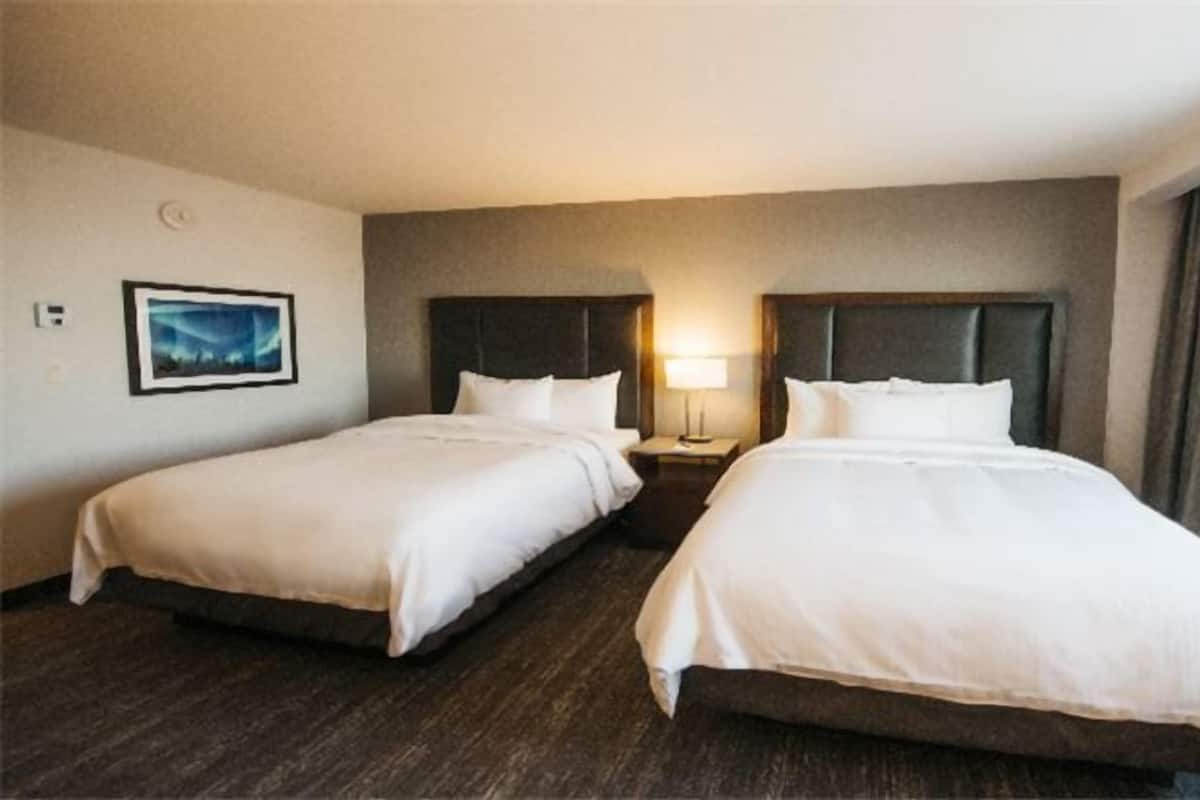 Premium bedding, pillow-top beds, in-room safe, desk