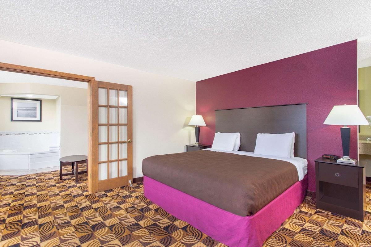 Desk, blackout drapes, iron/ironing board, free cribs/infant beds