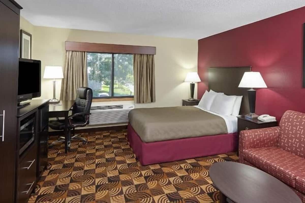 Desk, blackout drapes, iron/ironing board, free cribs/infant beds