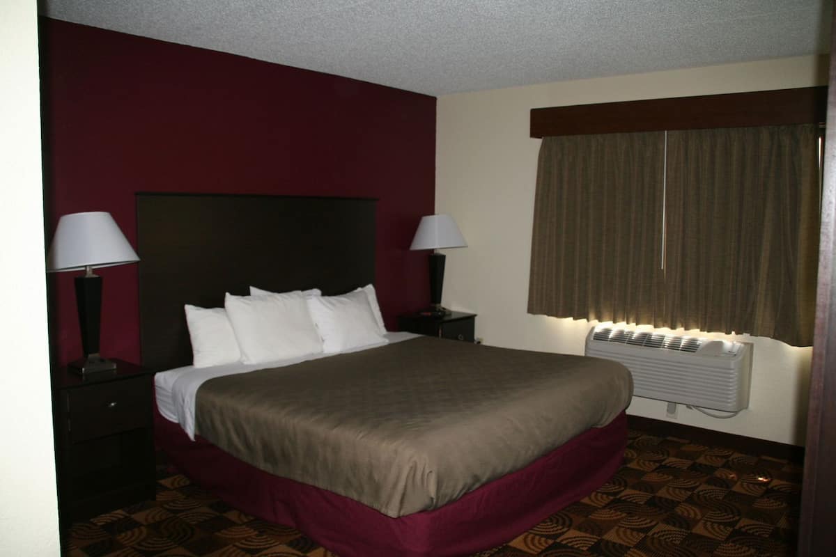 Desk, blackout drapes, iron/ironing board, free cribs/infant beds