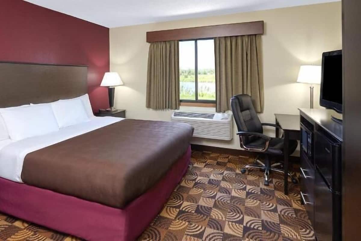 Desk, blackout drapes, iron/ironing board, free cribs/infant beds