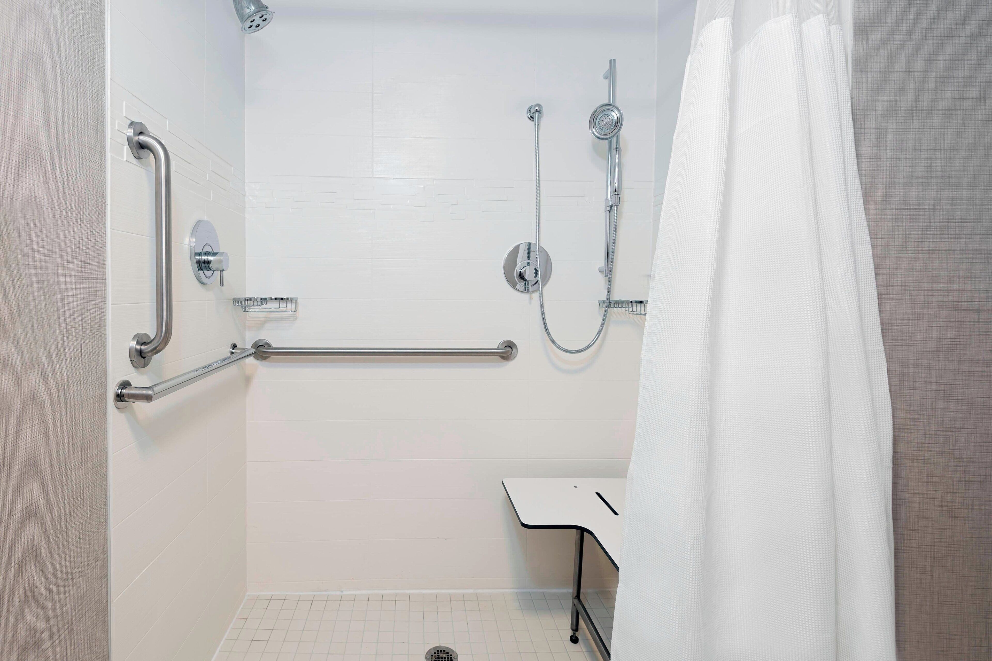 studio, 1 queen bed with sofa bed (mobility accessible, tub) | bathroom | combined shower/bathtub, free toiletries, hair dryer, towels