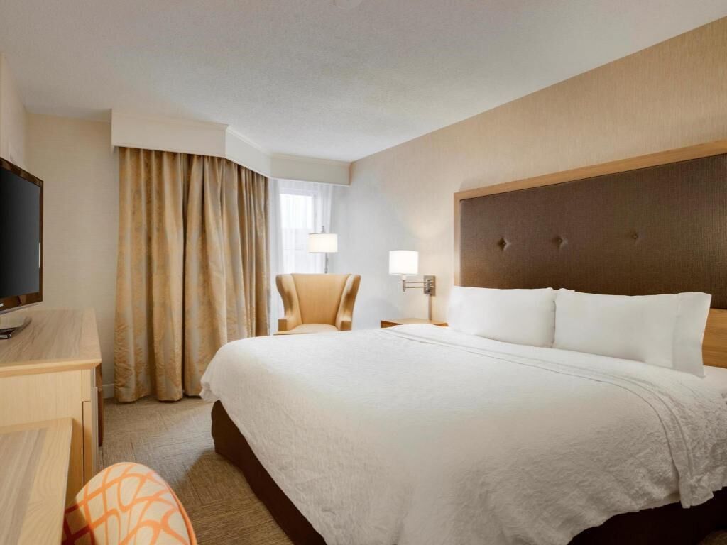 Premium bedding, pillow-top beds, desk, laptop workspace