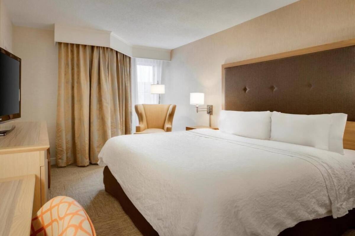 Premium bedding, pillow-top beds, desk, laptop workspace