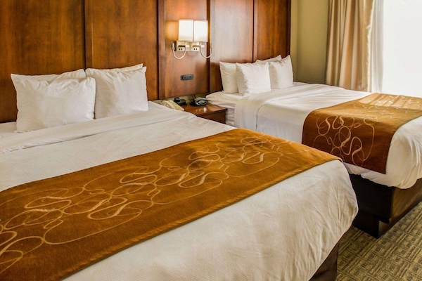 Suite, 2 Queen Beds, Non Smoking | Desk, blackout drapes, iron/ironing board, free cribs/infant beds