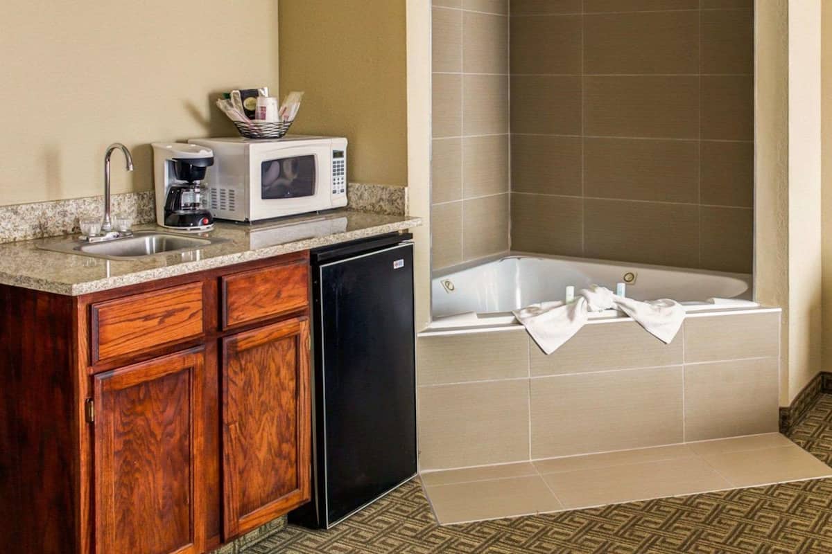 desk, blackout curtains, iron/ironing board, free cots/infant beds