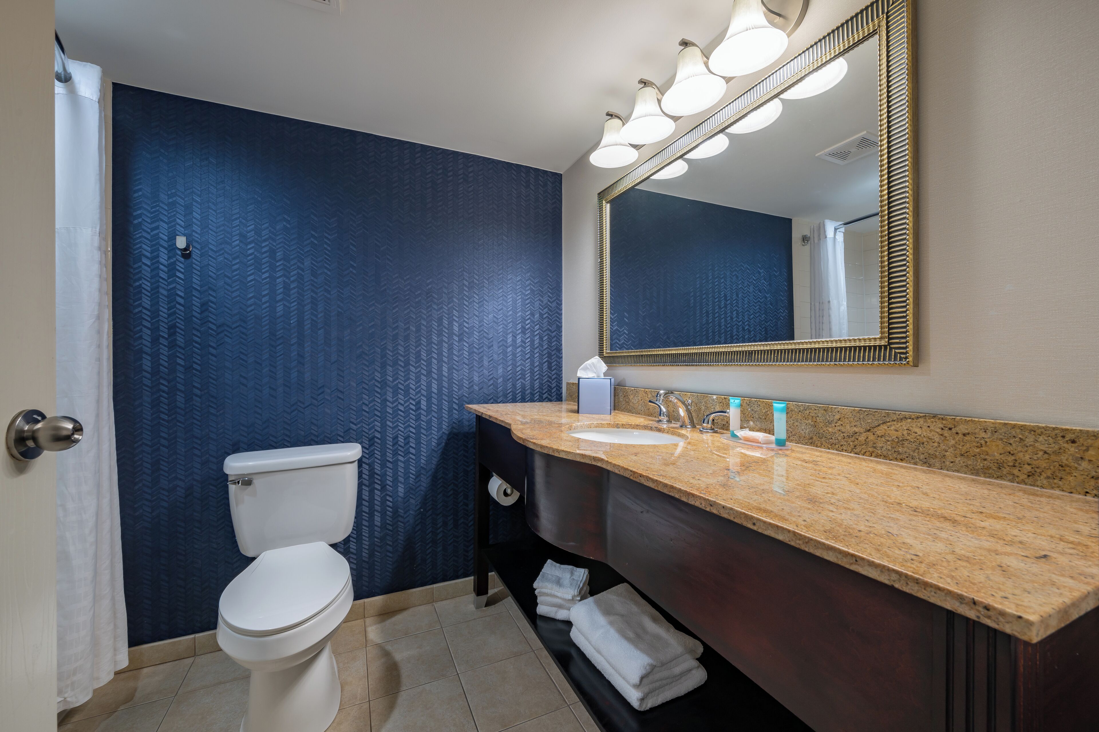 combined shower/bathtub, eco-friendly toiletries, hair dryer, towels