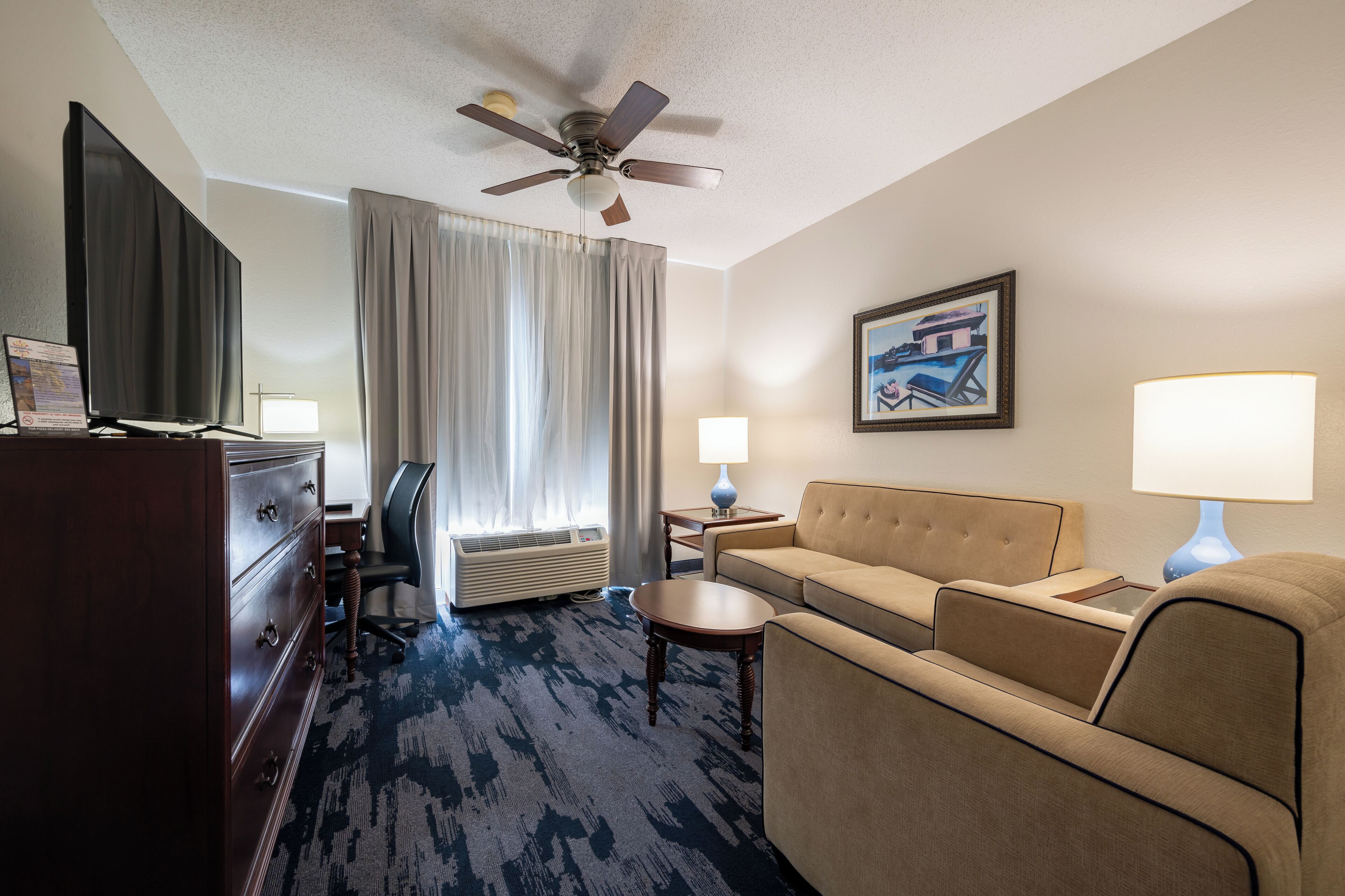 1 bedroom king suite with sofa bed | premium bedding, desk, laptop workspace, blackout curtains