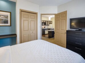 Pillow-top beds, desk, laptop workspace, blackout curtains