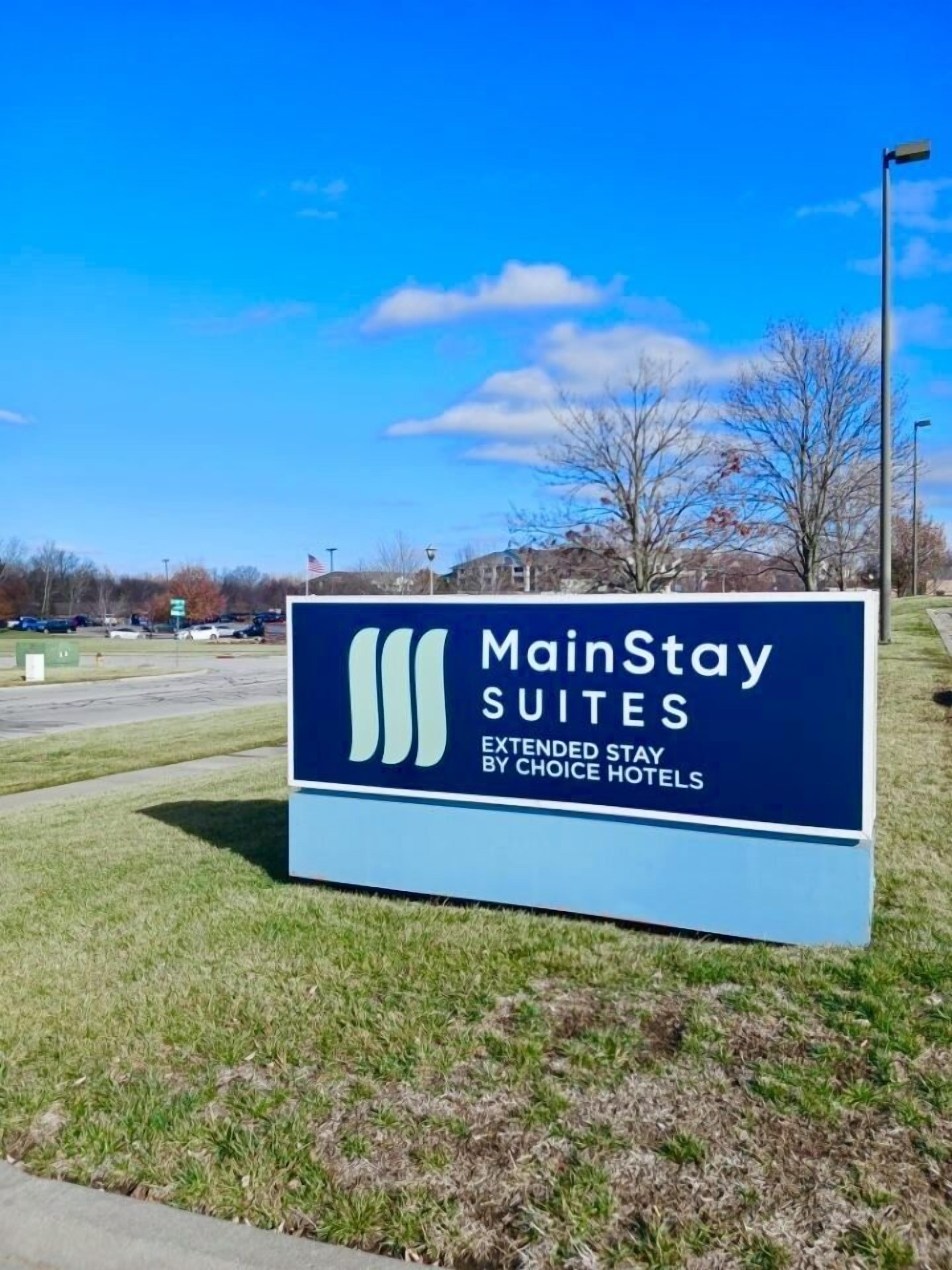 A sign for MainStay Suites, indicating extended stay by Choice Hotels.