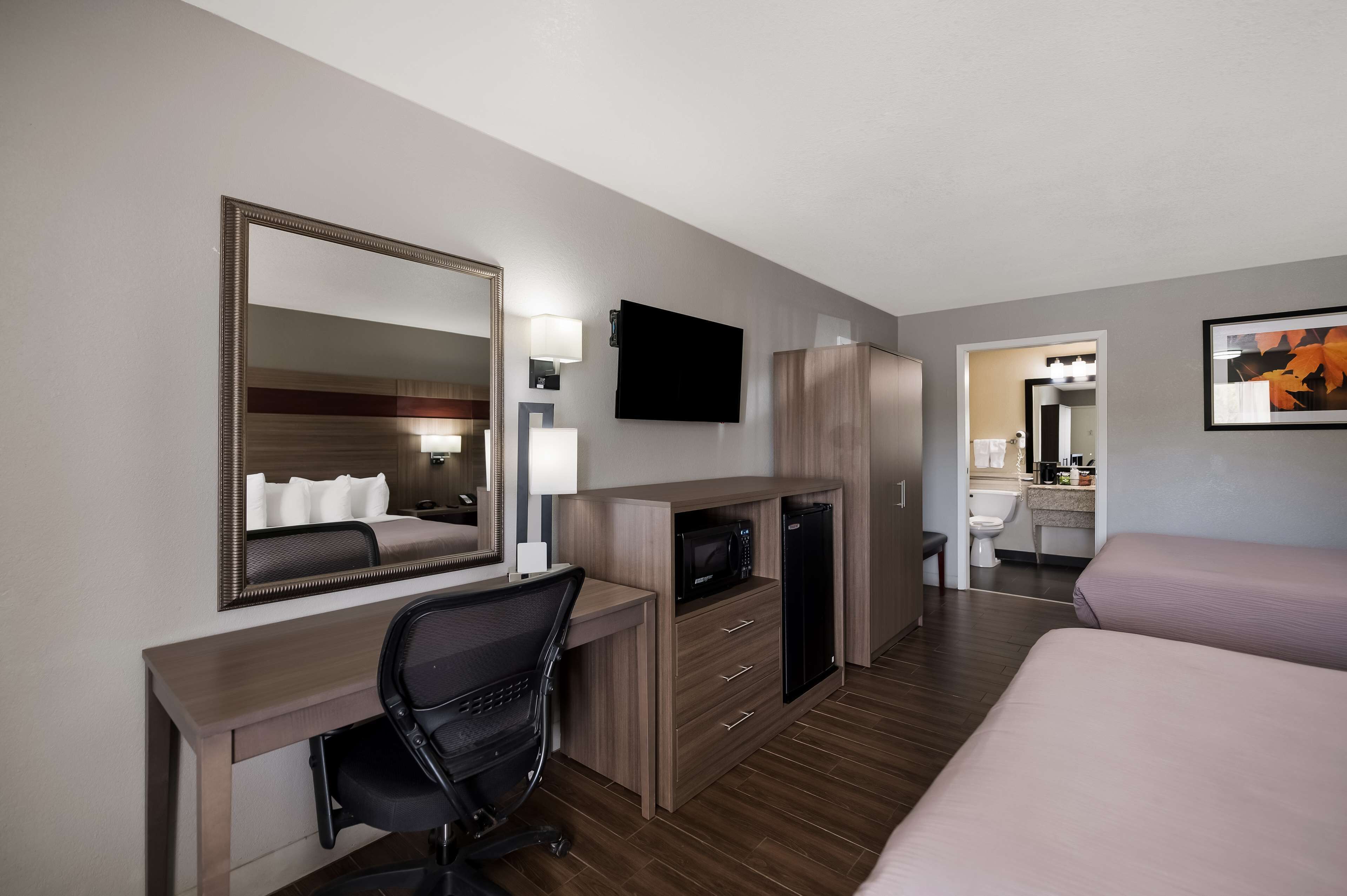 standard room, 2 queen beds, accessible, non smoking | pillow-top beds, desk, iron/ironing board, rollaway beds