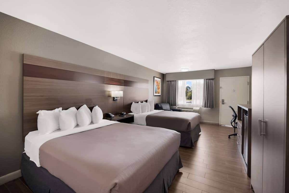 standard room, 2 queen beds, accessible, non smoking | pillow-top beds, desk, iron/ironing board, rollaway beds