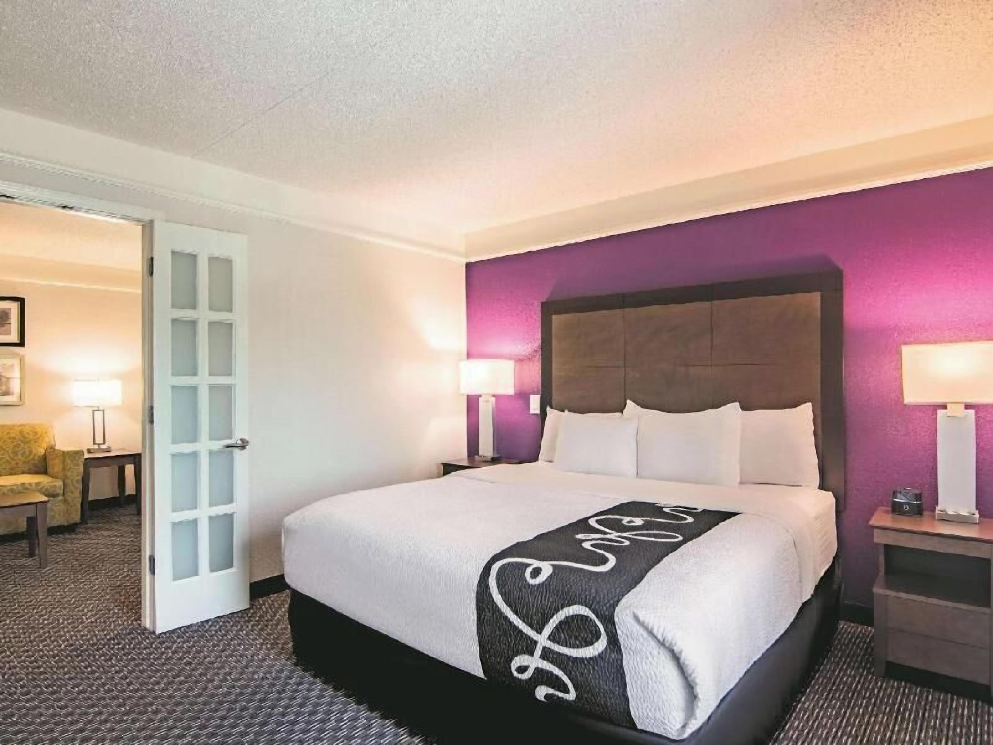 Premium bedding, desk, blackout drapes, iron/ironing board