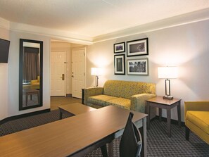 Suite, 1 King Bed, Non Smoking | Premium bedding, desk, blackout curtains, iron/ironing board