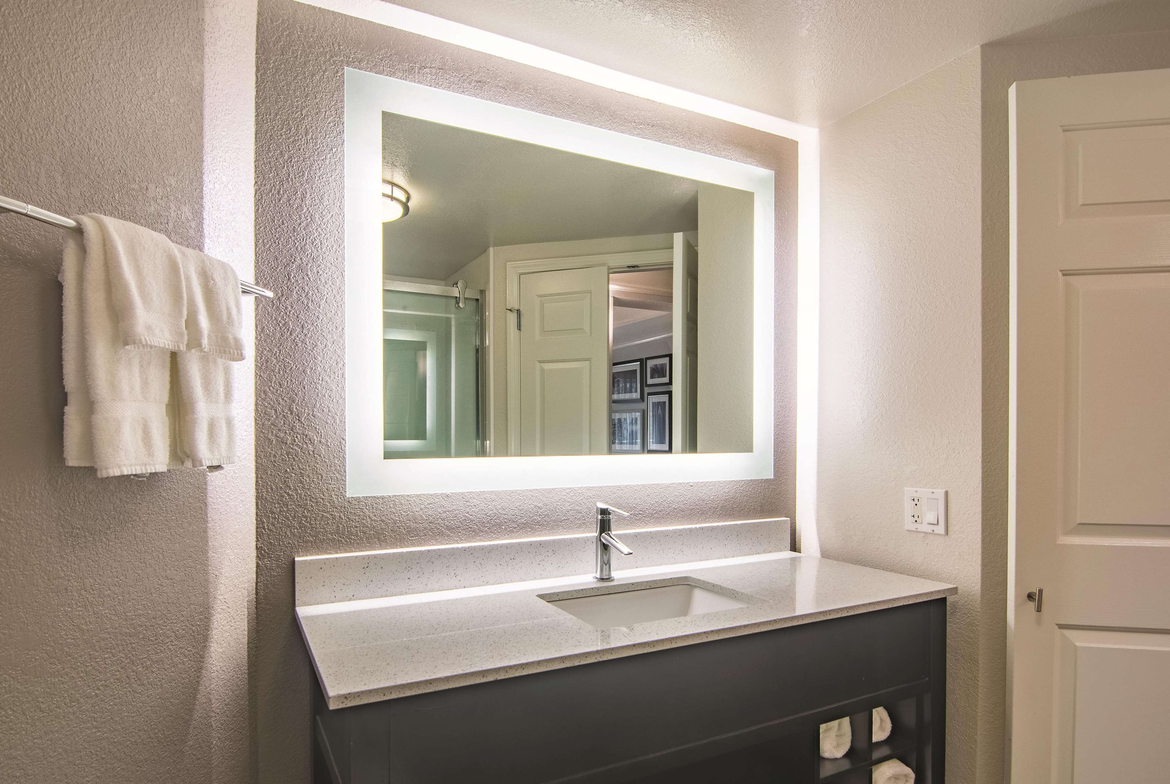 suite, 1 king bed, non smoking | premium bedding, desk, blackout curtains, iron/ironing board