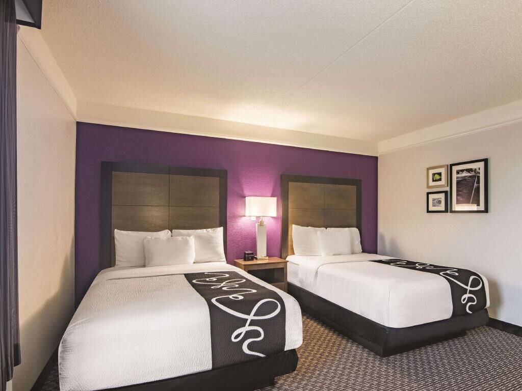 Premium bedding, desk, blackout drapes, iron/ironing board