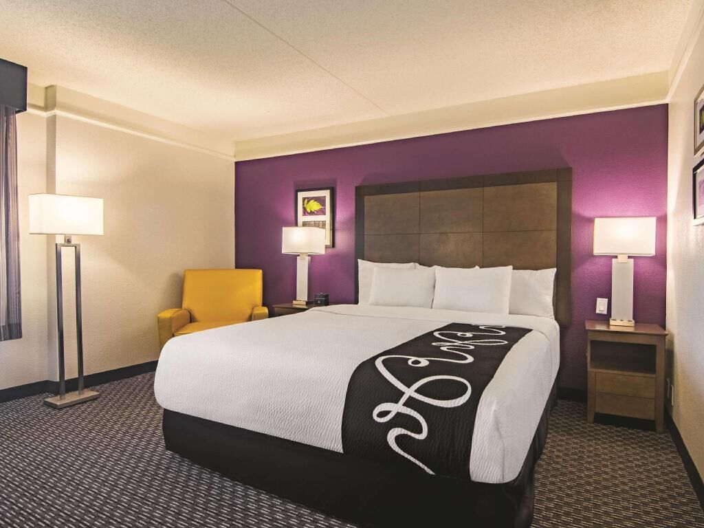 Premium bedding, desk, blackout drapes, iron/ironing board
