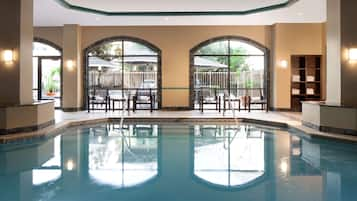 Indoor pool, open 6:00 AM to 10:00 PM, pool loungers