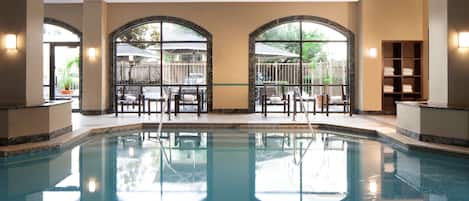 Indoor pool, open 6:00 AM to 10:00 PM, pool loungers