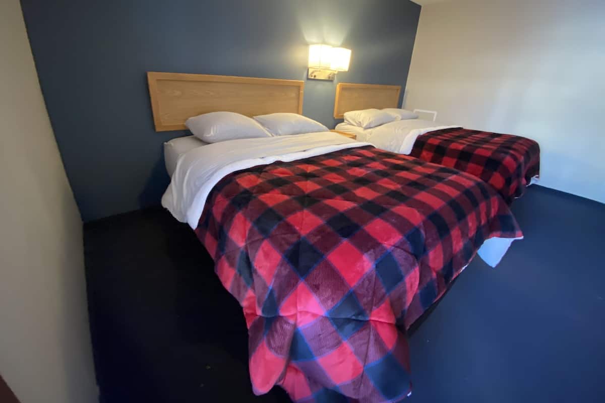 Standard Room, 2 Queen Beds | 1 bedroom, individually decorated, individually furnished, desk