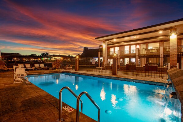 Outdoor pool, open 7:30 AM to 10 PM, pool loungers