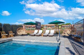 Outdoor pool, open 7:30 AM to 10 PM, sun loungers