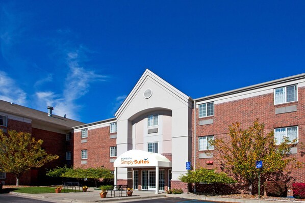 Welcome to Sonesta Simply Suites, where a charming entrance sets the tone for a relaxing stay.