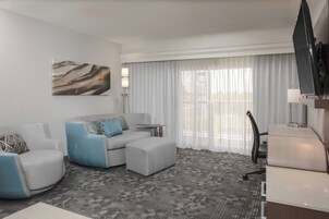 Suite, 1 Bedroom | Living room | 40-inch LCD TV with cable channels, TV