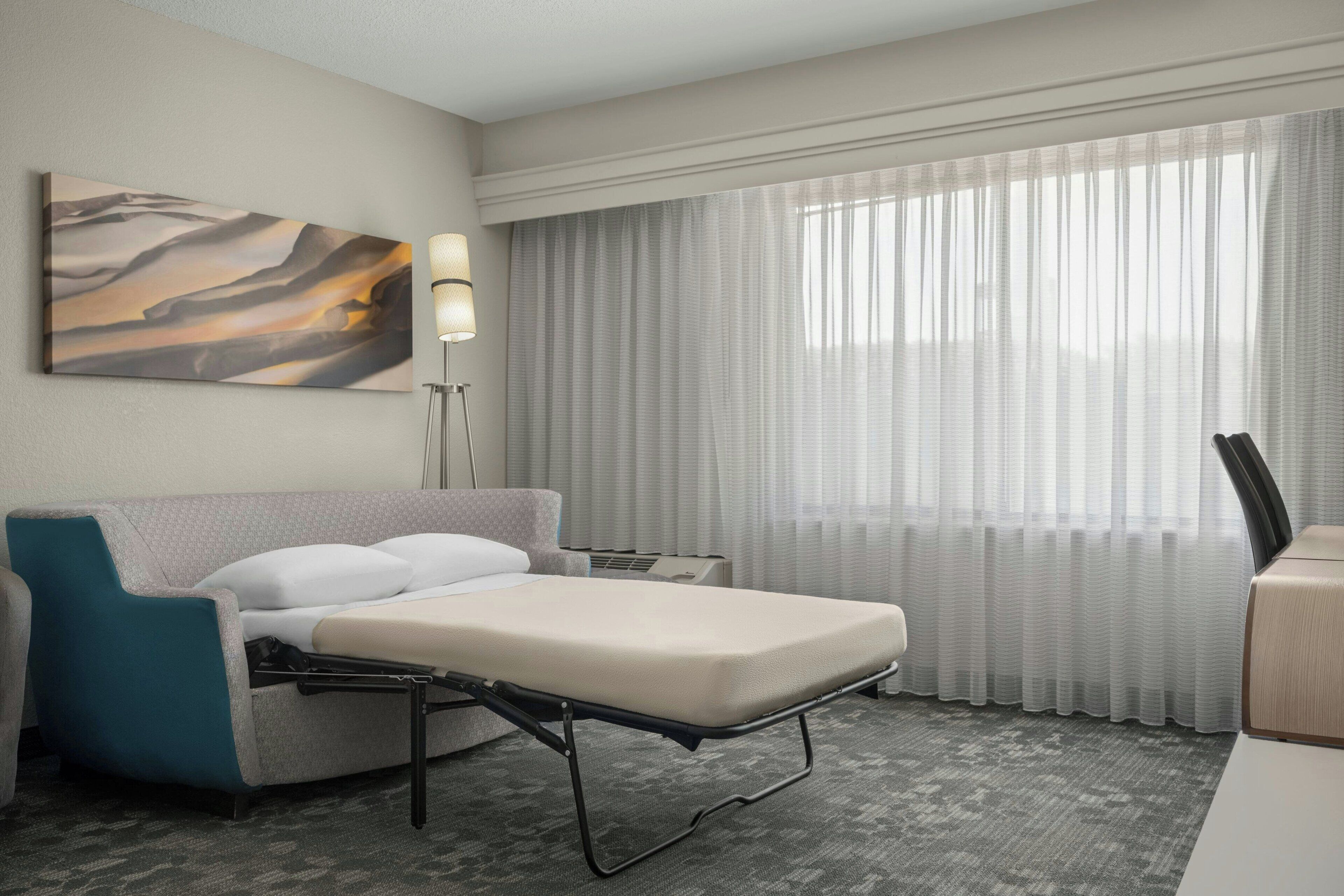 room, 1 king bed with sofa bed, non smoking | premium bedding, in-room safe, desk, laptop workspace