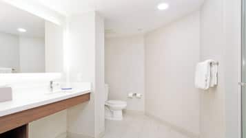 Suite, 1 King Bed, Accessible Bathtub (Mobility) | Bathroom | Eco-friendly toiletries, hair dryer, towels, soap