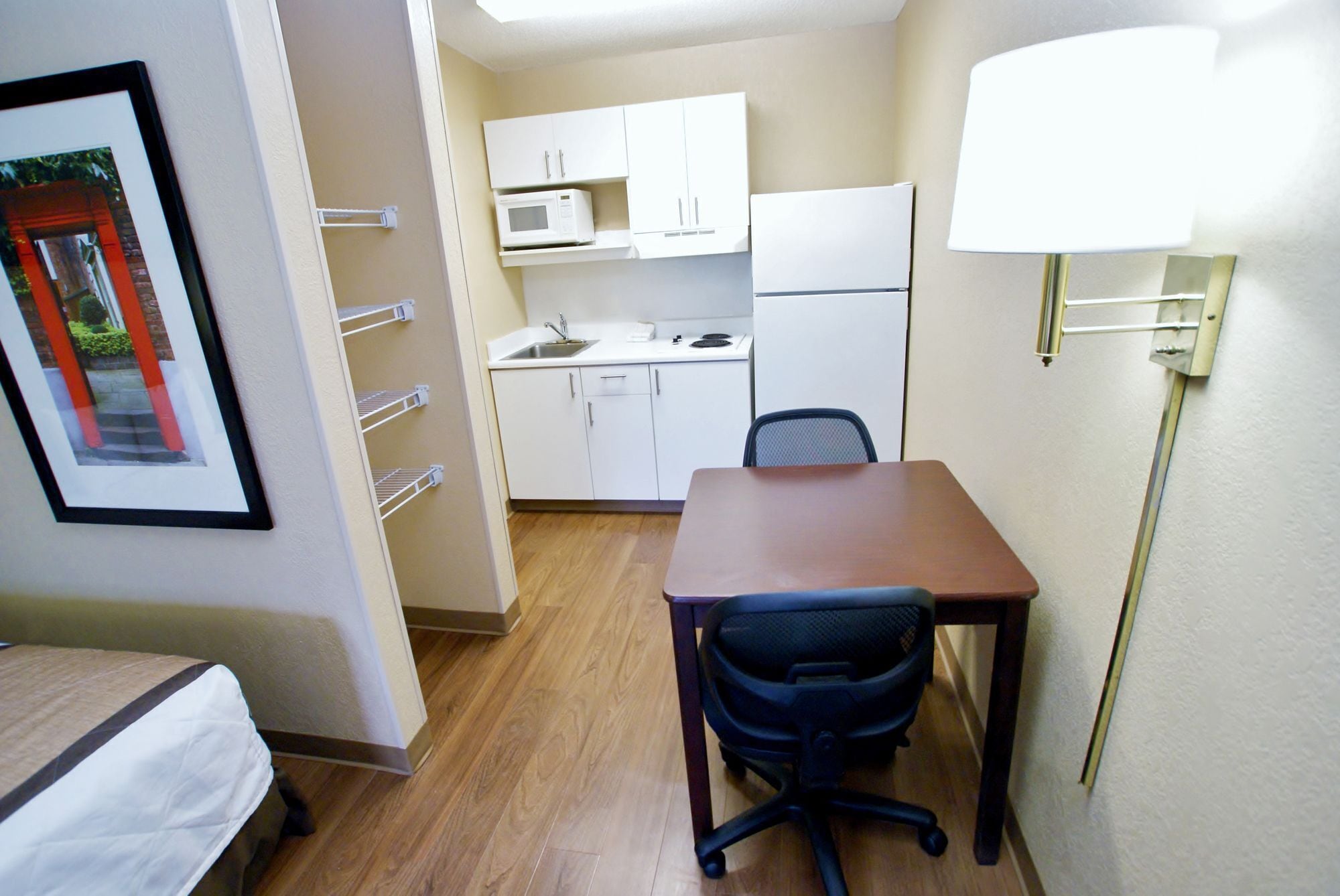 Full-size fridge, microwave, stovetop, coffee/tea maker