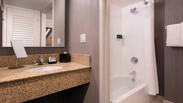 Combined shower/tub, designer toiletries, hair dryer, towels