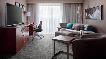 Executive Suite, 1 Bedroom | Living area | 50-inch LCD TV with satellite channels, TV