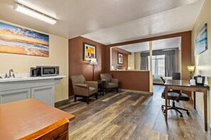 Standard Suite, 1 King Bed, Non Smoking | Desk, laptop workspace, iron/ironing board, free WiFi