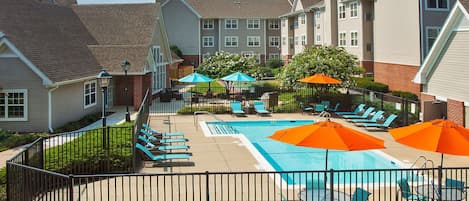 Seasonal outdoor pool, open 11:00 AM to 7:00 PM, pool umbrellas