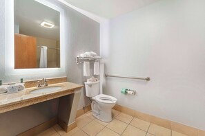 Deep soaking tub, hydromassage showerhead, hair dryer, towels