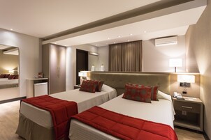 Ropa de cama de alta calidad y minibar 