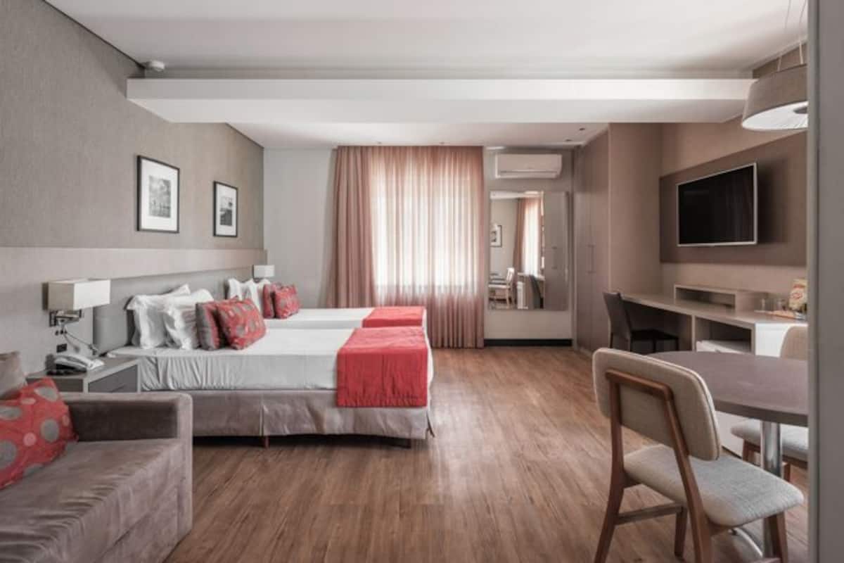 Ropa de cama de alta calidad y minibar