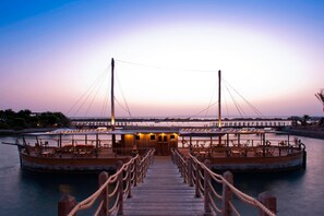 5 bars/lounges, 3 beach bars, poolside bar