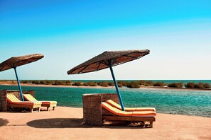 Private beach, sun-loungers, beach umbrellas, beach towels