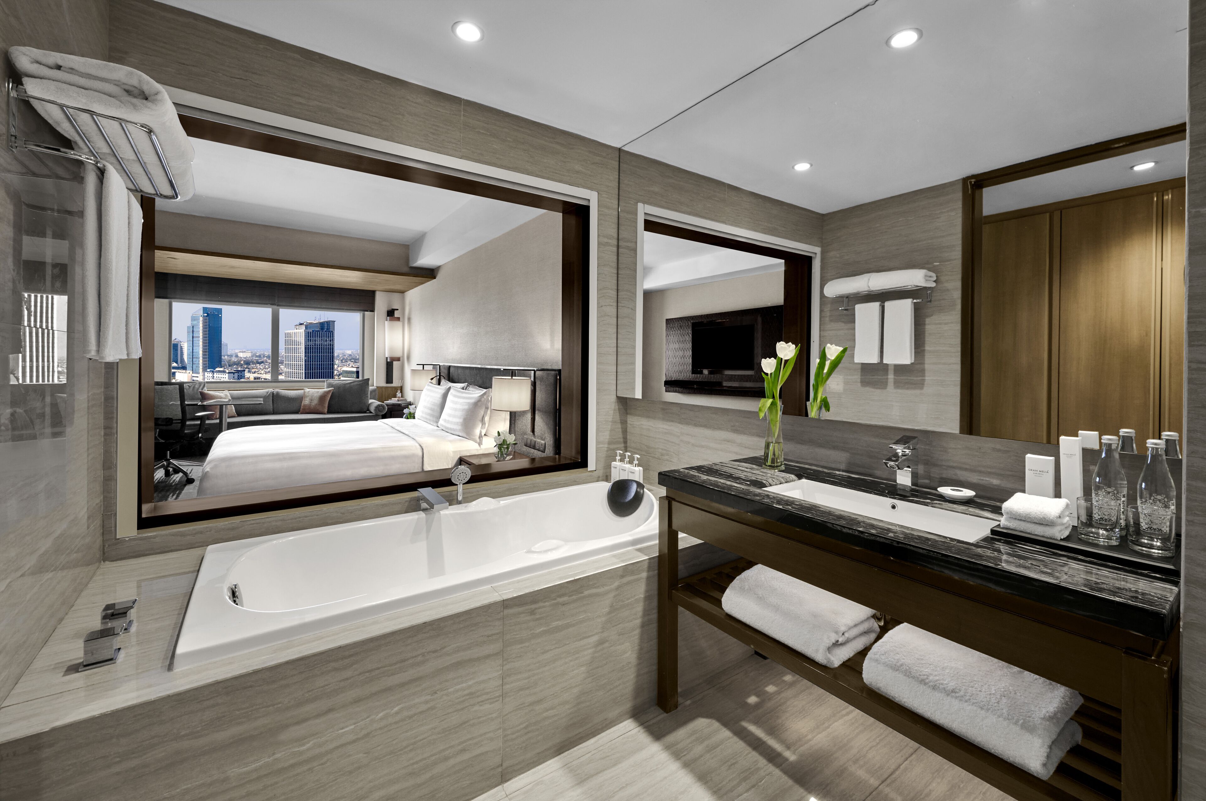 separate bathtub and shower, designer toiletries, hair dryer, bathrobes