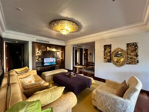Luxury Two Bedroom Residence with Pool View and Partial Ocean View | Living area | 42-inch Smart TV with cable channels, table tennis - Bintang Bali Resort (Kuta)